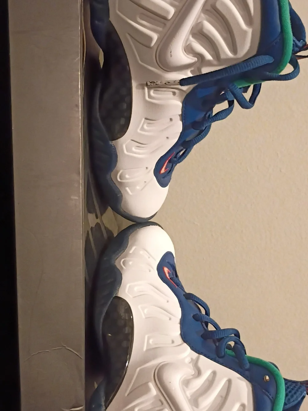 Nike Kids White and Blue Sneakers with Green and Orange Accents
